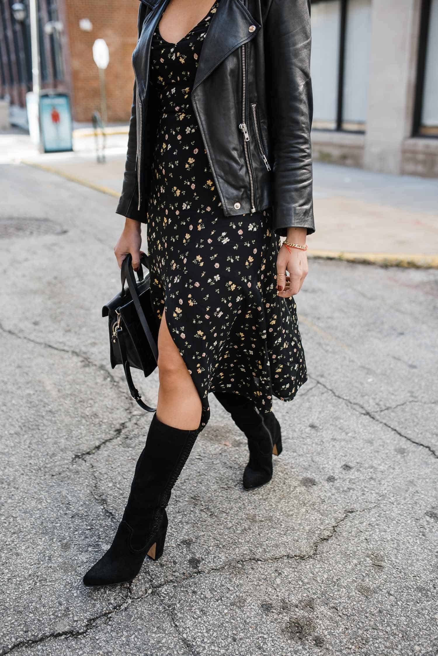 black suede knee high boots with a midi dress